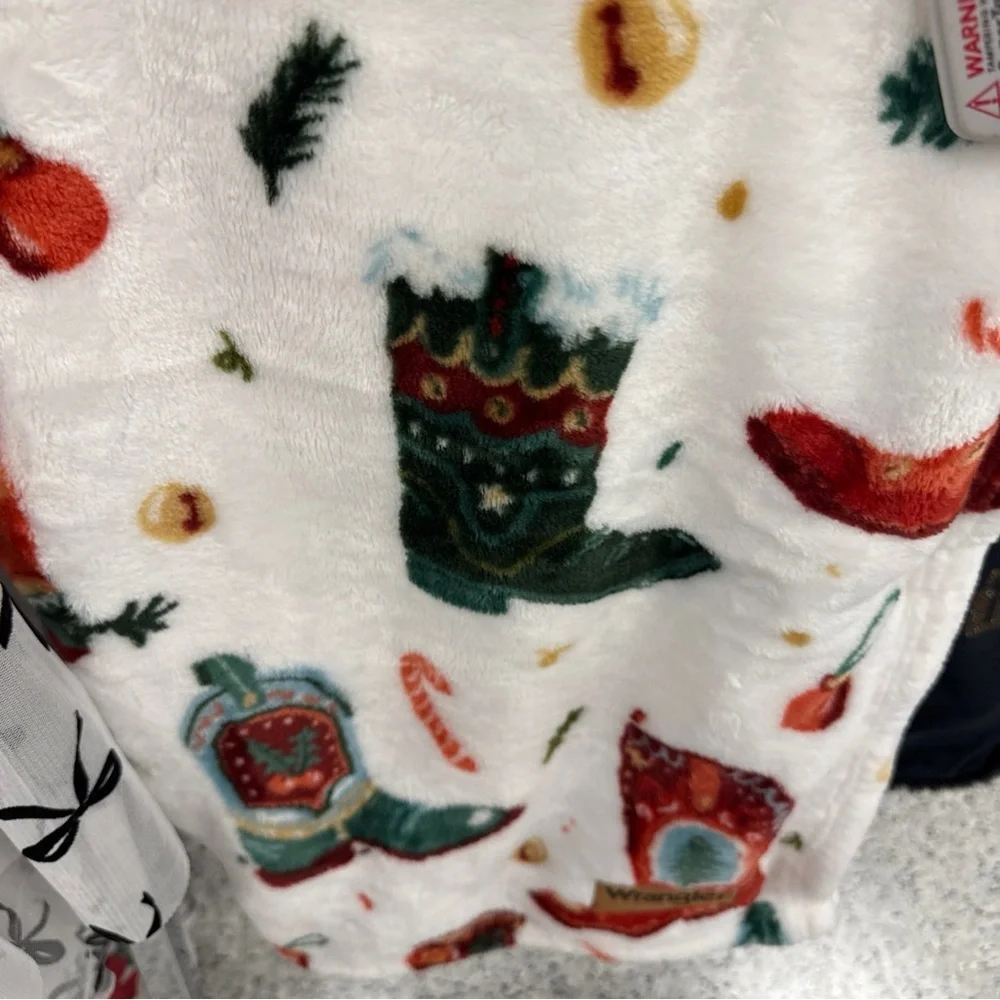 Wrangler Plush Throw with Red and Green festive Webstern boots Accents